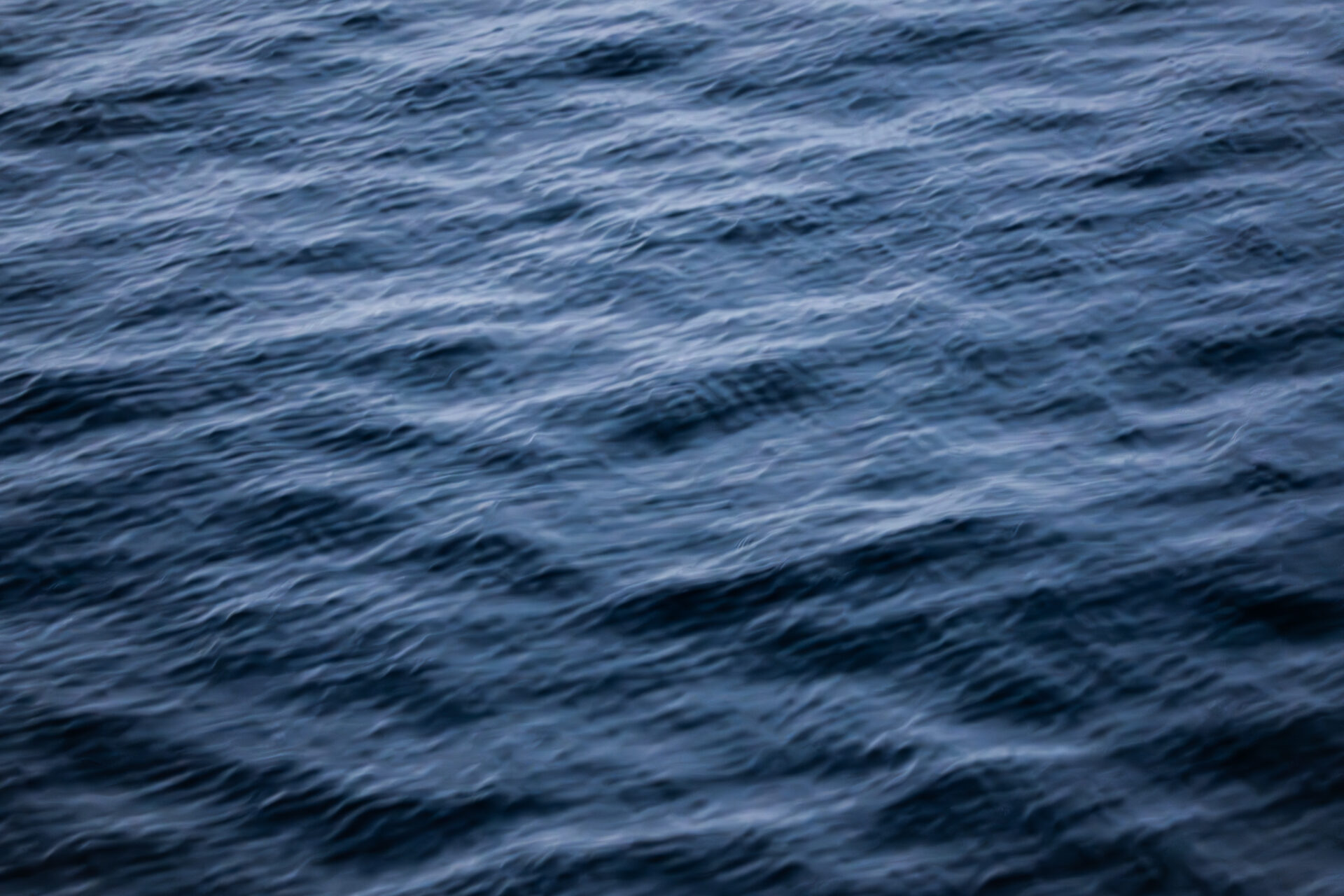 Dark fjord water in winter